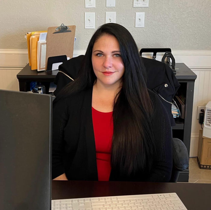 Receptionist and client relations, Lea, at Scott Spradley Law Office in Flagler Beach, FL