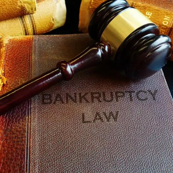 gavel on top of an old book titled "Bankruptcy Law" in Florida